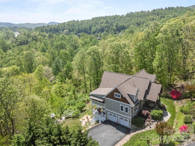 bird's eye view featuring a view of trees