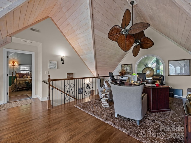 living area featuring wood finished floors, a ceiling fan, wood ceiling, and lofted ceiling