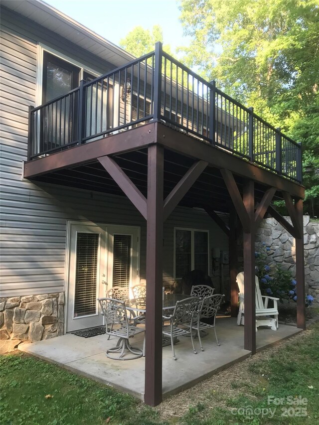 view of patio featuring a wooden deck