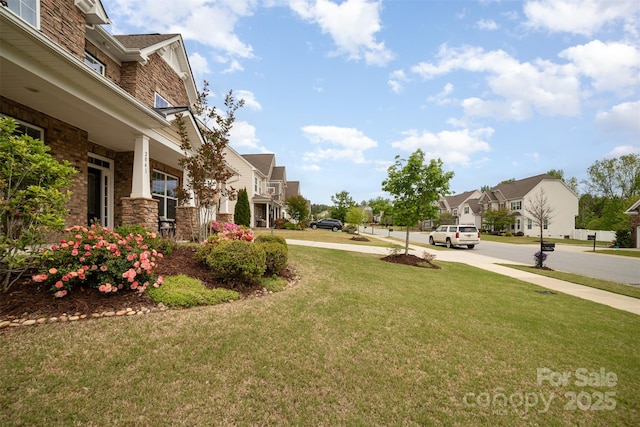 view of yard with a residential view