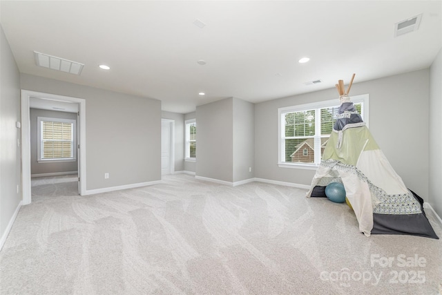 sitting room featuring visible vents, recessed lighting, baseboards, and carpet floors