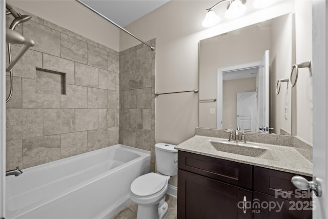 full bath with vanity, toilet, and shower / washtub combination