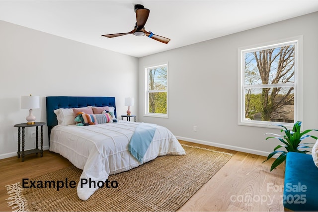 4 Chestnut Ridge Ave, Asheville, NC 28804 - bedroom with baseboards, a ceiling fan, and wood finished floors