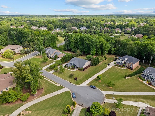birds eye view of property with a residential view