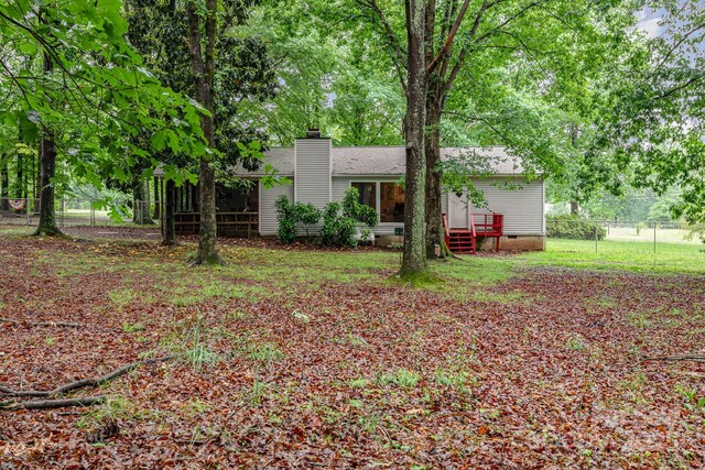 6804 Lineberger Rd, Denver, NC 28037 - view of front of house with a chimney, fence, a sunroom, and crawl space