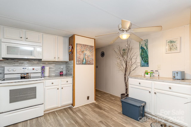 6804 Lineberger Rd, Denver, NC 28037 - kitchen with white appliances, light wood-style flooring, white cabinets, and light countertops