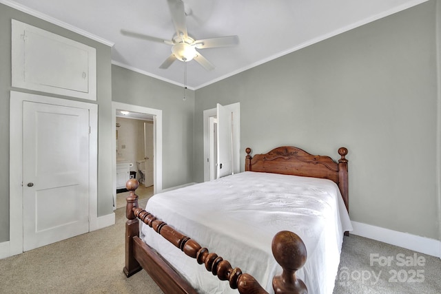 bedroom with ceiling fan, carpet, baseboards, ensuite bathroom, and ornamental molding