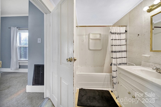 bathroom featuring crown molding, vanity, baseboards, shower / tub combo, and visible vents