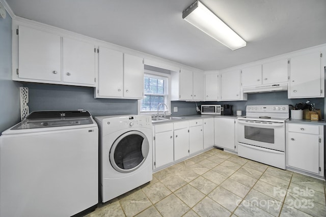 laundry area with washer and dryer, laundry area, and a sink