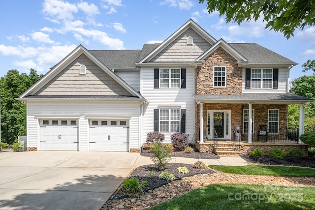 7730 Windsor Forest Pl, Harrisburg, NC 28075 - view of front of property featuring an attached garage, stone siding, concrete driveway, a porch, and roof with shingles