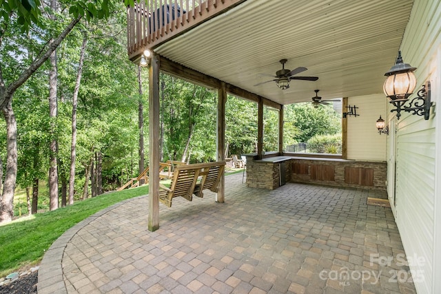 7730 Windsor Forest Pl, Harrisburg, NC 28075 - view of patio with ceiling fan