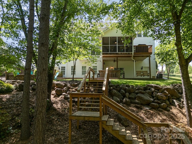 7730 Windsor Forest Pl, Harrisburg, NC 28075 - rear view of property with stairway, a deck, a ceiling fan, and central AC