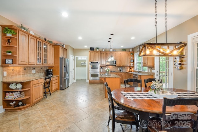 7730 Windsor Forest Pl, Harrisburg, NC 28075 - dining area with light tile patterned floors, baseboards, and recessed lighting