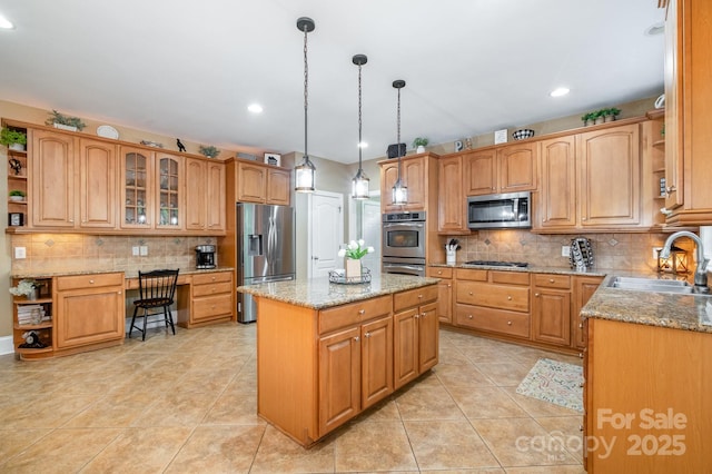 7730 Windsor Forest Pl, Harrisburg, NC 28075 - kitchen with a sink, stainless steel appliances, decorative backsplash, a center island, and light tile patterned floors