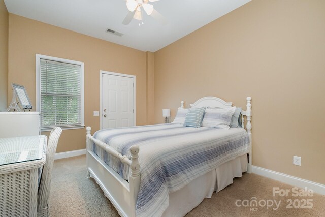 7730 Windsor Forest Pl, Harrisburg, NC 28075 - bedroom with baseboards, ceiling fan, carpet flooring, and visible vents