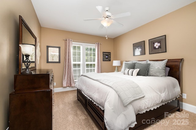 7730 Windsor Forest Pl, Harrisburg, NC 28075 - bedroom with ceiling fan, light carpet, and baseboards