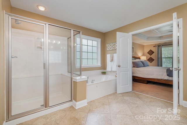 7730 Windsor Forest Pl, Harrisburg, NC 28075 - ensuite bathroom featuring ensuite bath, a shower stall, tile patterned flooring, a garden tub, and crown molding