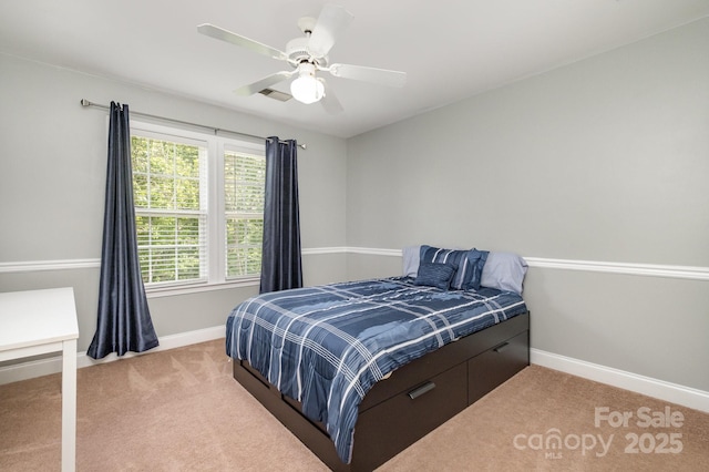 7730 Windsor Forest Pl, Harrisburg, NC 28075 - bedroom with light colored carpet, visible vents, baseboards, and ceiling fan