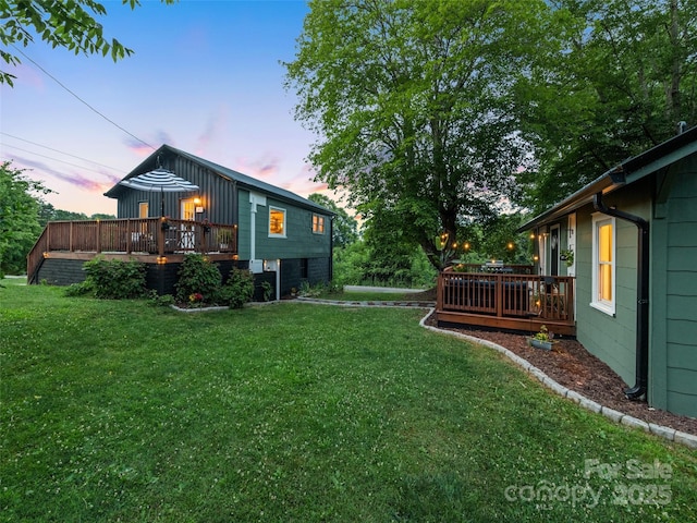 68 Piney Mountain Church Rd, Candler, NC 28715 - yard at dusk with a deck