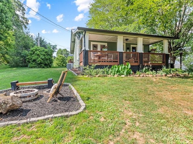 68 Piney Mountain Church Rd, Candler, NC 28715 - exterior space featuring a porch, a lawn, and cooling unit