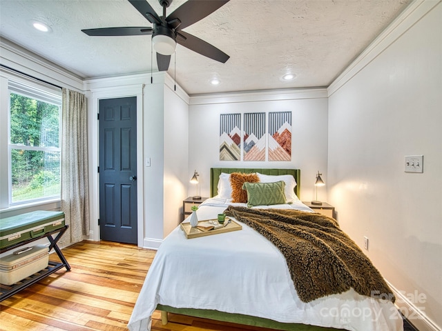 68 Piney Mountain Church Rd, Candler, NC 28715 - bedroom featuring ceiling fan, a textured ceiling, light wood-style flooring, recessed lighting, and baseboards