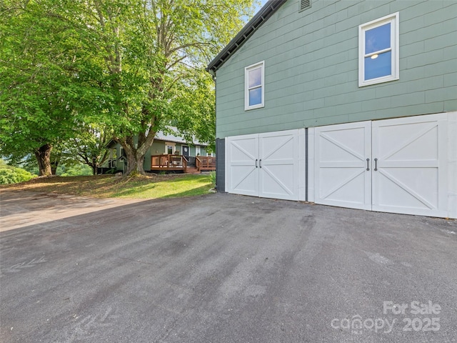 68 Piney Mountain Church Rd, Candler, NC 28715 - garage featuring driveway
