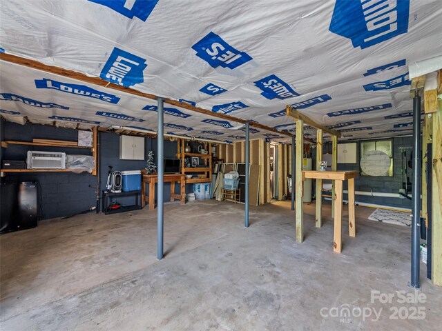 68 Piney Mountain Church Rd, Candler, NC 28715 - basement featuring concrete block wall and water heater