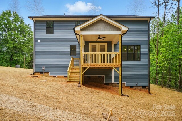 rear view of house with a wooden deck, ceiling fan, stairway, and crawl space