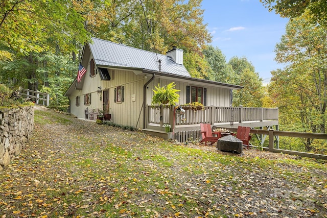 197 Gardenside Rd, Mars Hill, NC 28754 - back of property with a chimney, a deck, and metal roof