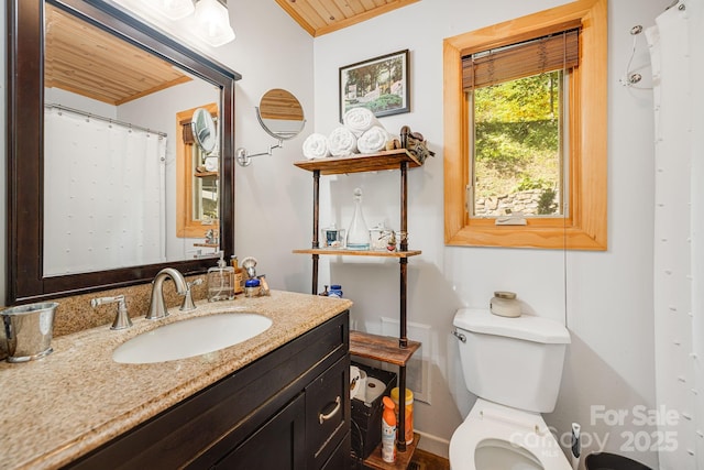197 Gardenside Rd, Mars Hill, NC 28754 - bathroom with crown molding, vanity, baseboards, wooden ceiling, and toilet