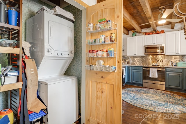 197 Gardenside Rd, Mars Hill, NC 28754 - washroom with stacked washing maching and dryer, wooden ceiling, laundry area, and wood finished floors