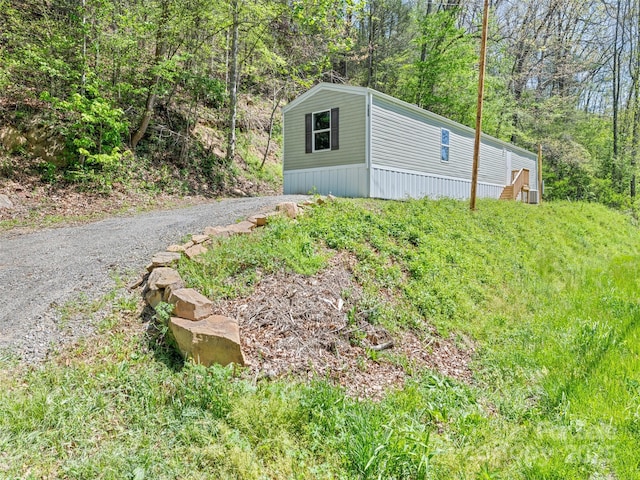 700 Cove Creek Rd, Waynesville, NC 28785 - view of outdoor structure with an outbuilding and gravel driveway