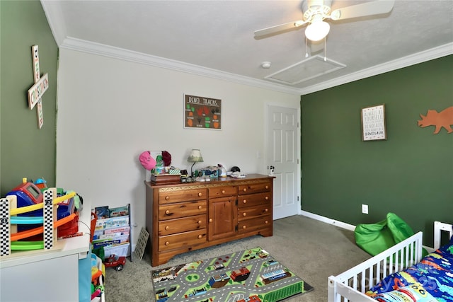 carpeted bedroom featuring crown molding, a crib, ceiling fan, and baseboards