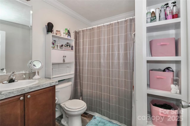 bathroom with toilet, ornamental molding, a shower with shower curtain, and vanity