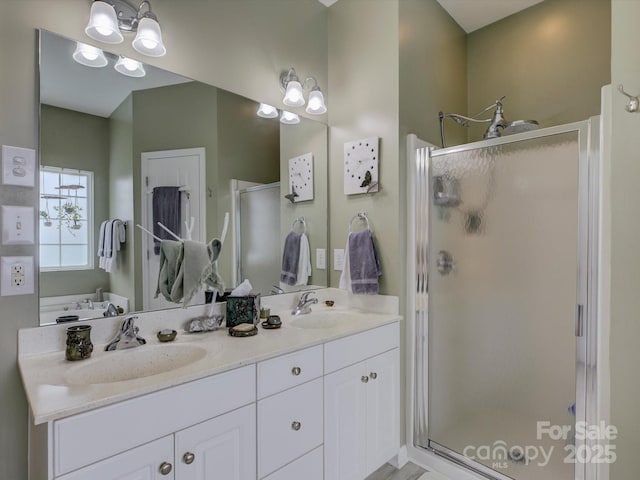 433 Linsbury Ct, Gastonia, NC 28056 - bathroom featuring double vanity, a sink, and a stall shower