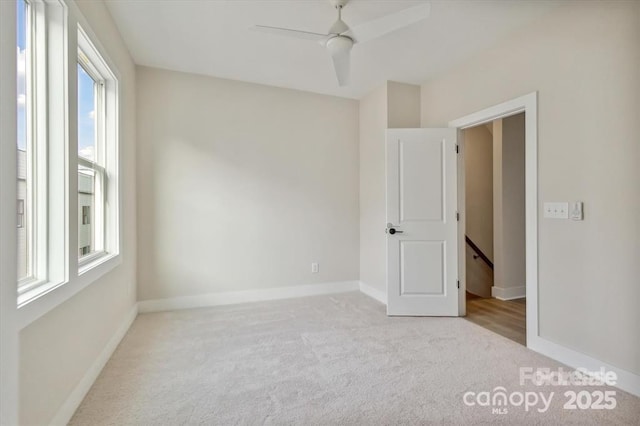 842 Van Every St, Charlotte, NC 28205 - carpeted empty room featuring a ceiling fan and baseboards