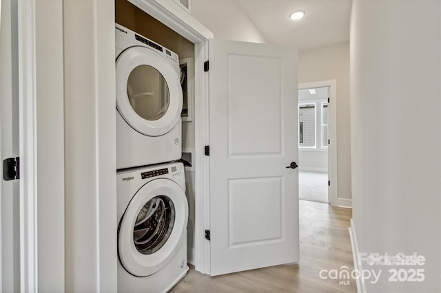 842 Van Every St, Charlotte, NC 28205 - laundry room featuring recessed lighting, laundry area, light wood-type flooring, and stacked washer / dryer