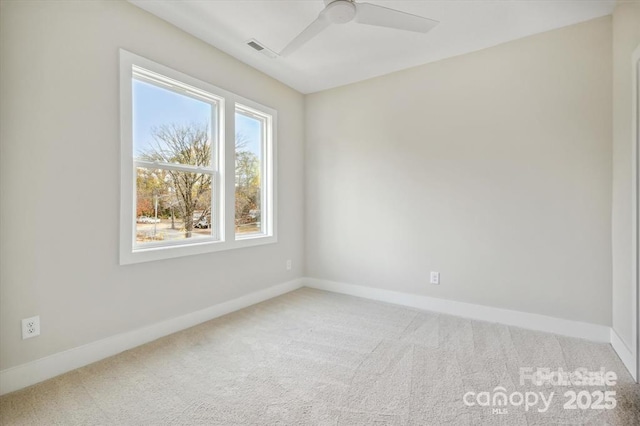 842 Van Every St, Charlotte, NC 28205 - unfurnished room with baseboards, carpet, a ceiling fan, and visible vents