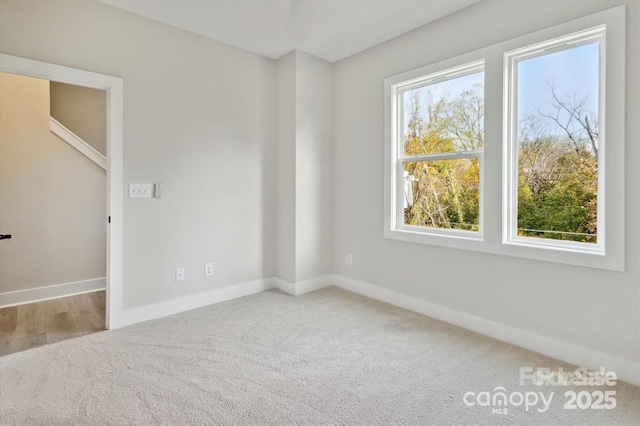 842 Van Every St, Charlotte, NC 28205 - carpeted spare room featuring baseboards