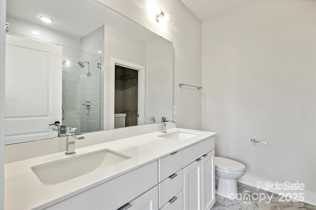 842 Van Every St, Charlotte, NC 28205 - full bath featuring a sink, marble finish floor, a stall shower, and toilet
