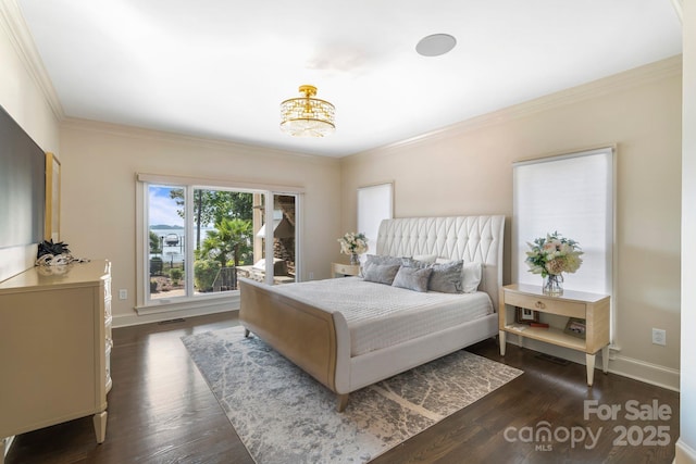 bedroom with crown molding and dark wood-style flooring