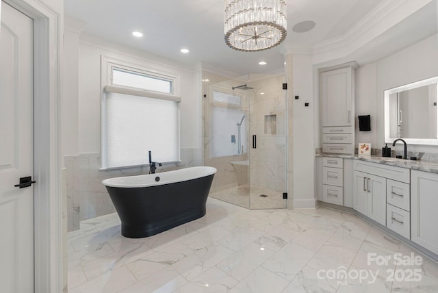 full bath featuring ornamental molding, marble finish floor, and a shower stall