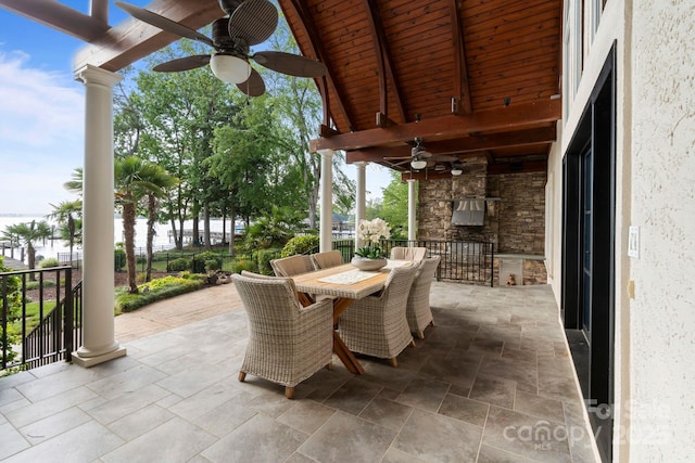 view of patio featuring a ceiling fan and outdoor dining space