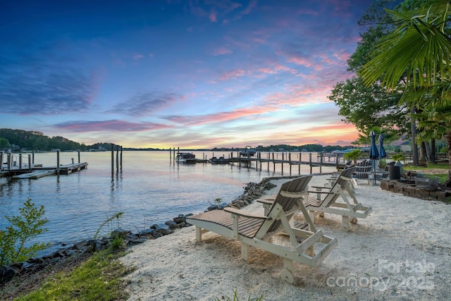 view of dock with a water view