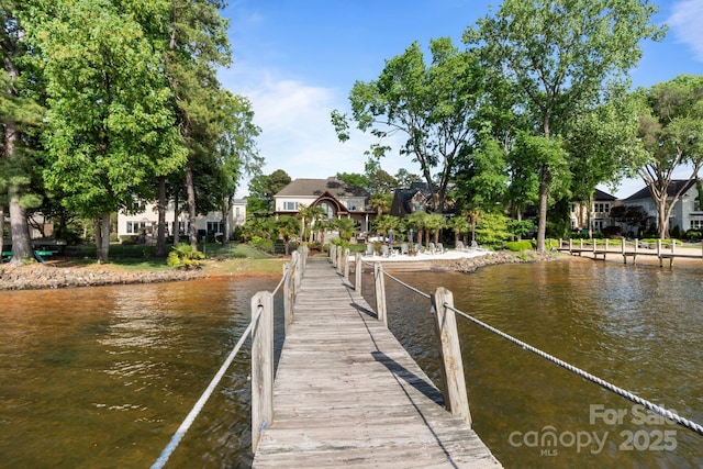 dock area featuring a water view
