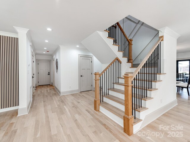 3501 Providence Rd, Charlotte, NC 28211 - stairs featuring wood finished floors, ornamental molding, baseboards, and recessed lighting