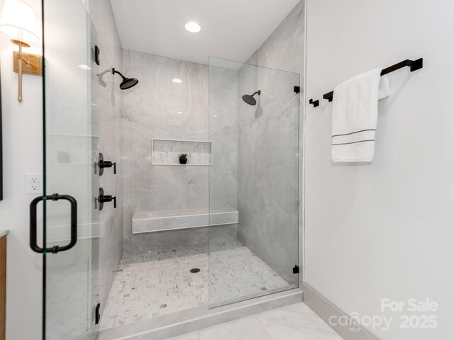 3501 Providence Rd, Charlotte, NC 28211 - full bath featuring a stall shower, marble look tile flooring, and baseboards