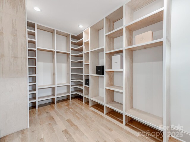 3501 Providence Rd, Charlotte, NC 28211 - walk in closet featuring wood finished floors