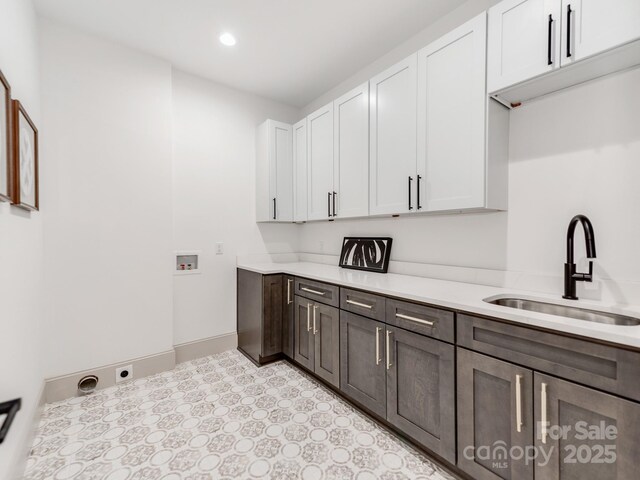 3501 Providence Rd, Charlotte, NC 28211 - washroom with washer hookup, cabinet space, recessed lighting, light flooring, and baseboards