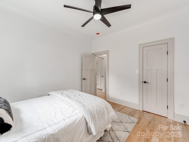 3501 Providence Rd, Charlotte, NC 28211 - bedroom featuring light wood-type flooring, crown molding, and ceiling fan